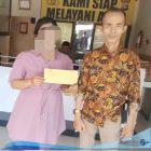 Foto: Korban bersama Pendamping Pelapor saat ke Polsek Bukit Raya. 