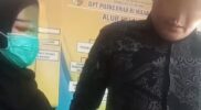 Foto ber-geotag di depan meja pelayanan UPT Puskesmas Muara Fajar, Pekanbaru, pada 30 Juli 2026. Terlihat seorang oknum petugas perempuan berhijab hitam dan bermasker, serta seorang oknum dokter gigi laki-laki mengenakan baju batik, yang diduga intimidasi anggota LSM.
